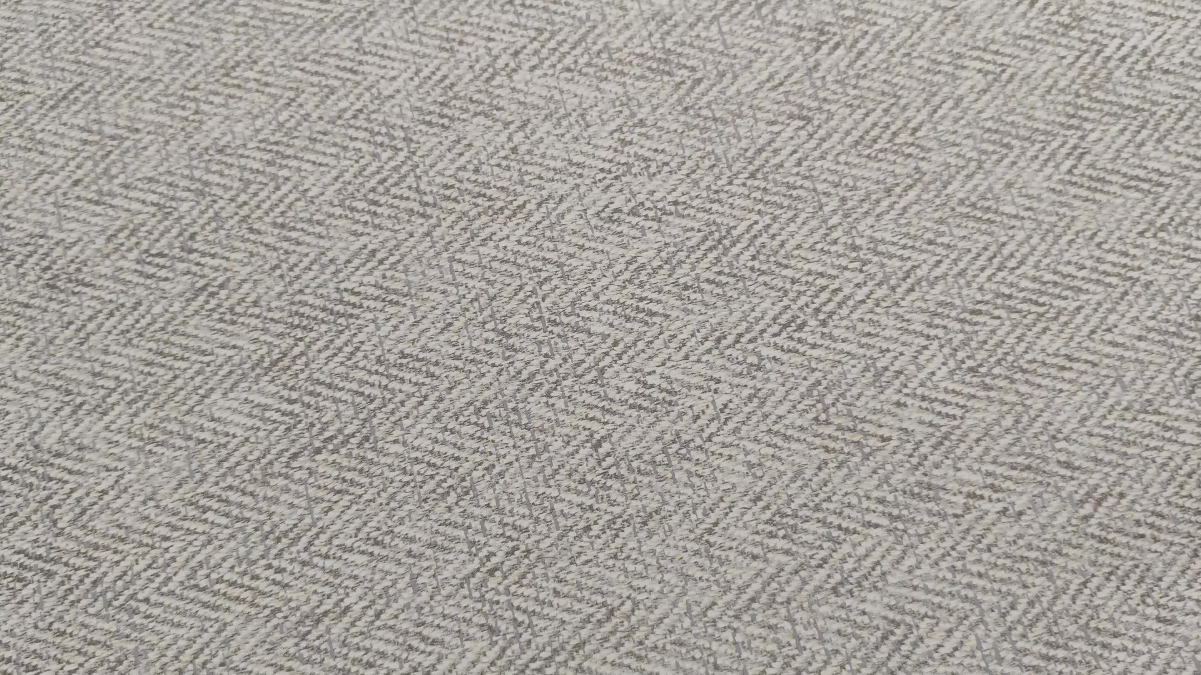 Apró shevron mintás enyhén struktúrált szürke dekor tapéta