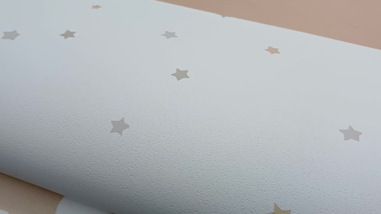 Gyerek tapéta apró csillag mintával kékes pasztel színekkel