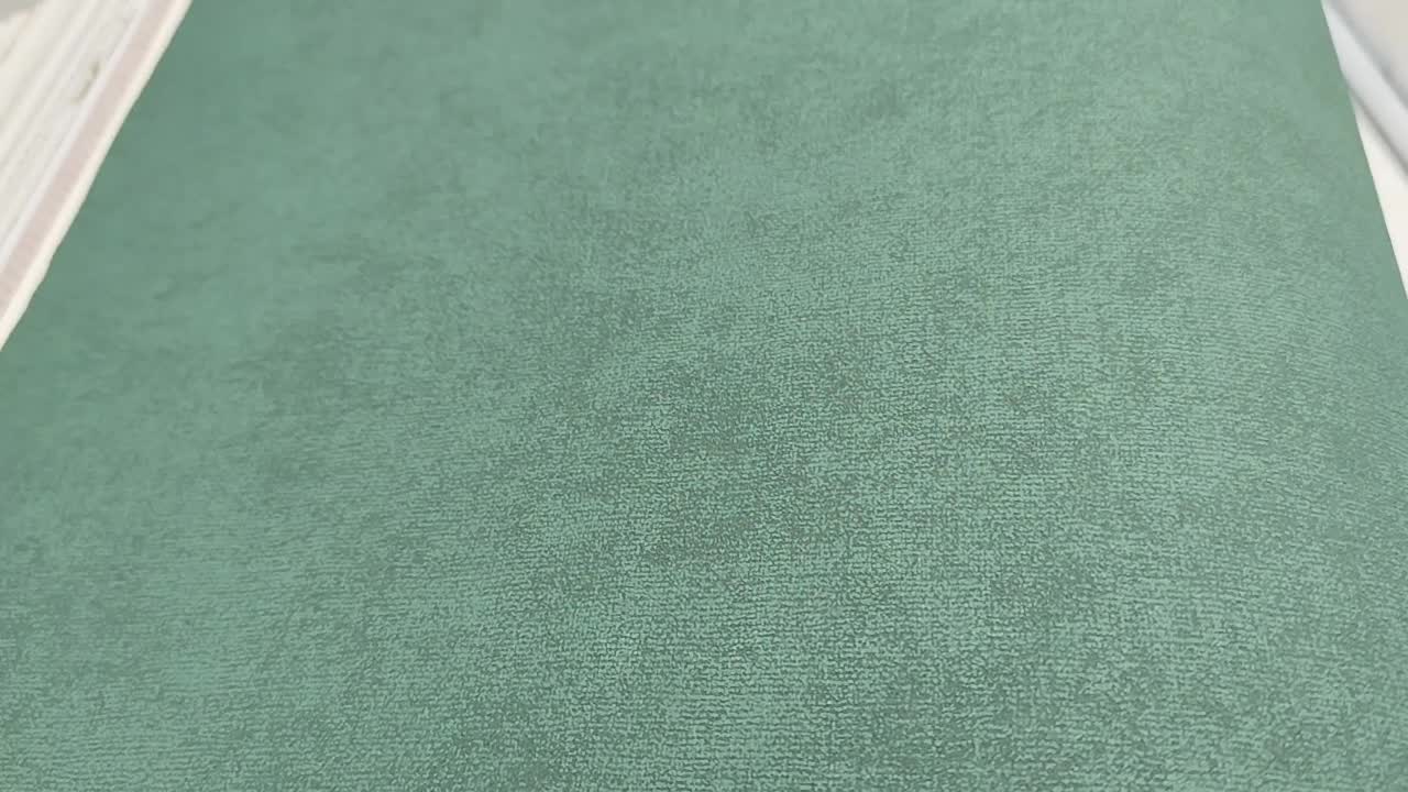 Zöld egyszinű vlies dekor tapéta