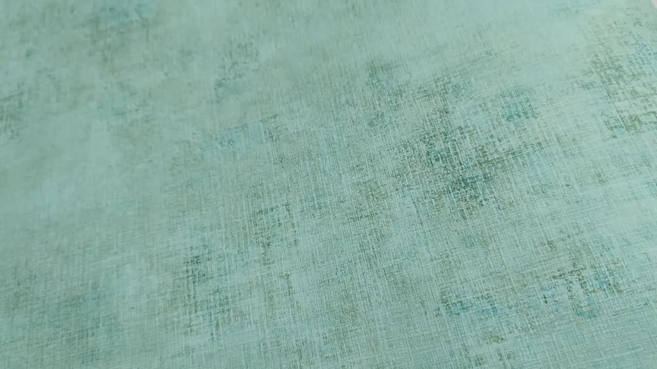 Türkiz zöld koptatott foltos hatásu design tapéta