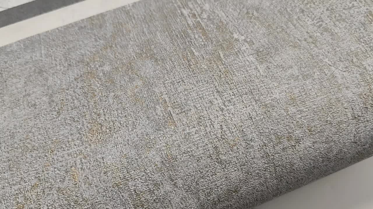 Ezüstös szürke színű beton hatású tapéta