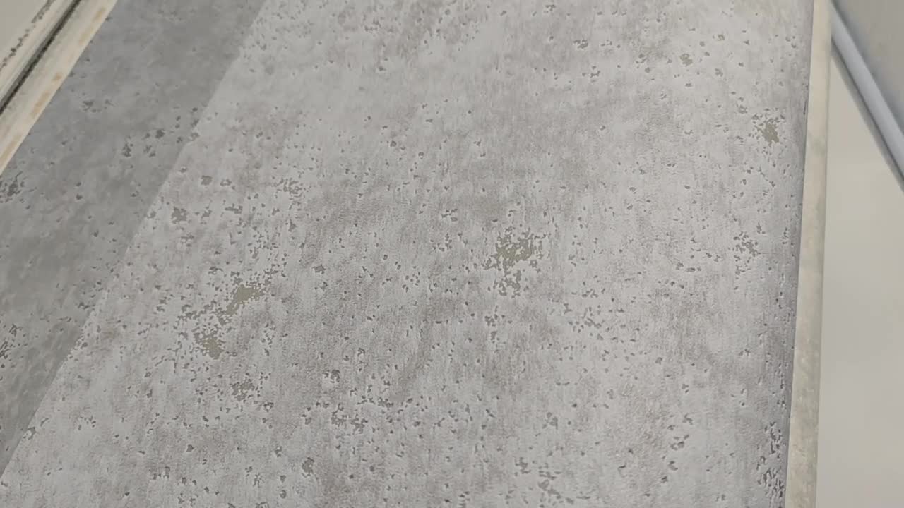 Betonhatású szürke vlies tapéta