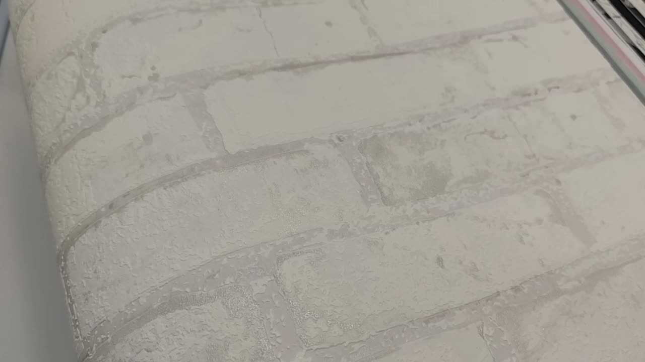 Fehér téglamintás vlies tapéta habosított felülettel