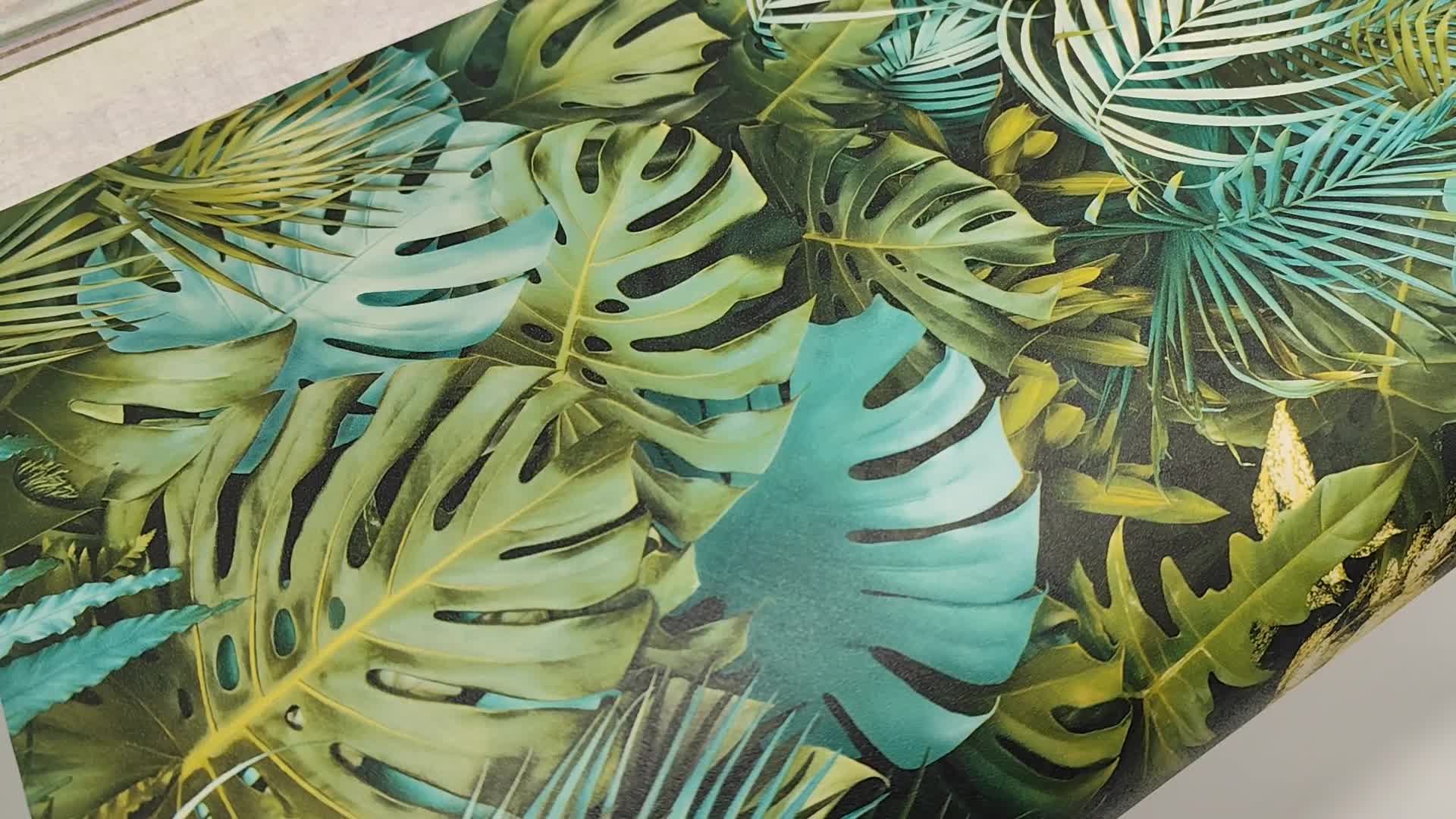 Kék-zöld trópusi levélmintás vlies tapéta