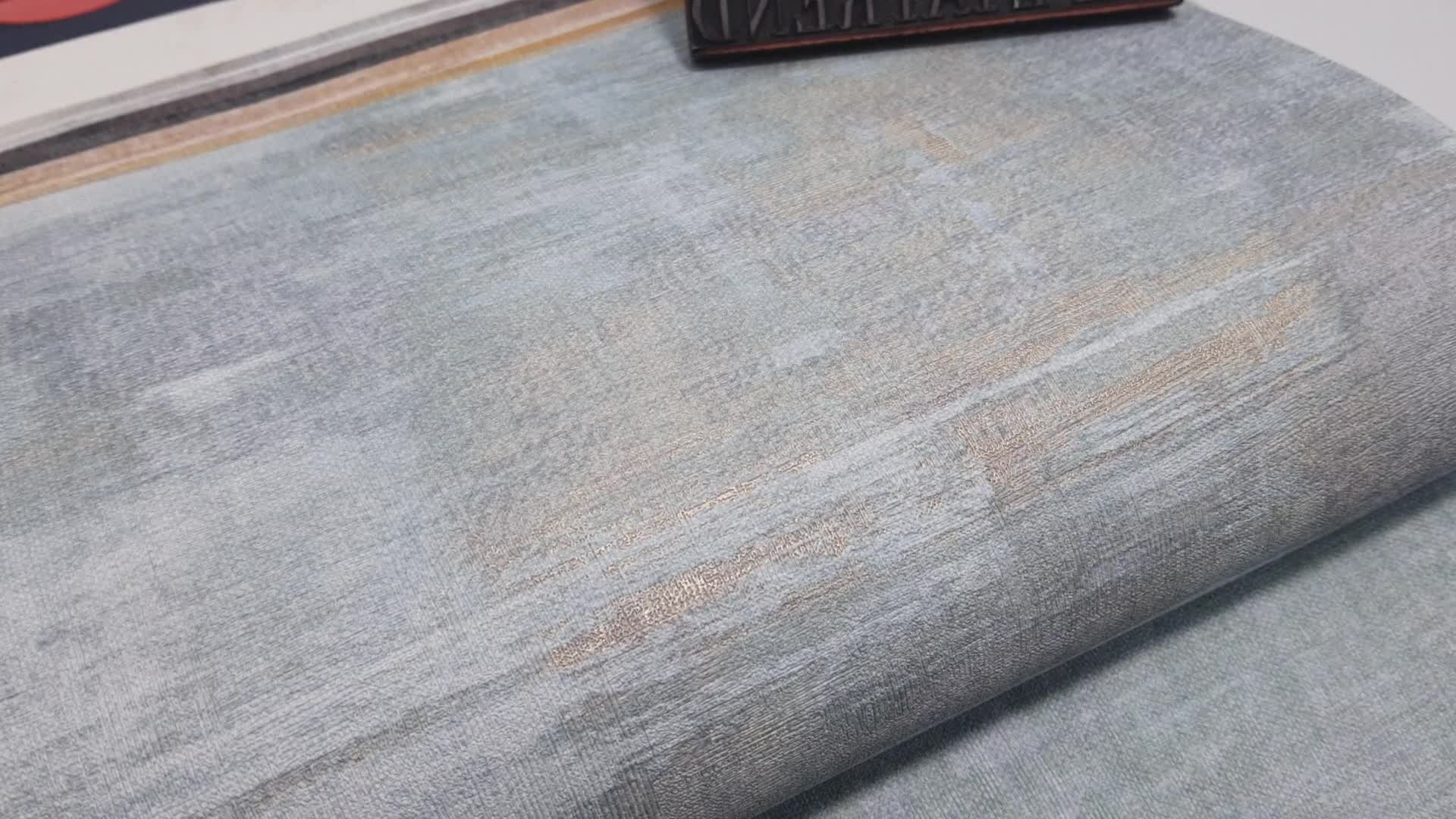 Halvány türkiz arany koptatott hatású vlies design tapéta