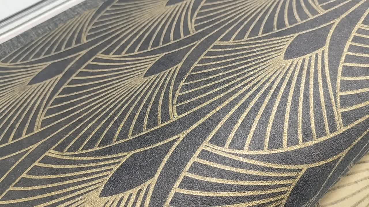 Art deco mintás vlies tapéta fekete arany színben